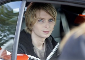 Chelsea Manning is seated in the back seat of a vehicle as she departs The Nantucket Project's annual gathering, Sunday, Sept. 17, 2017, in Nantucket, Mass.