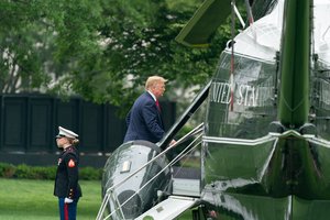 President Donald Trump boards Marine One on the South Lawn of The White House for his flight to Joint Base Andrews, Md. Wednesday, May 8, 2019, and his trip to Tyndall Air Force Base, Fla.