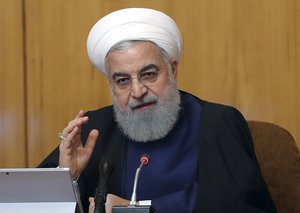 In this photo released by the official website of the office of the Iranian Presidency, President Hassan Rouhani speaks in a cabinet meeting in Tehran, Iran, Wednesday, May 8, 2019.