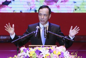 Taiwan's ruling Nationalist Party chairman and presidential candidate in the 2016 elections Eric Chu gestures during an extraordinary party congress in Taipei, Taiwan, Saturday, Oct. 17, 2015.