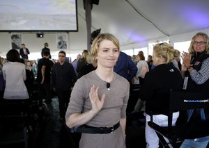 Chelsea Manning departs the stage after addressing an audience, Sunday, Sept. 17, 2017, during a forum, in Nantucket, Mass.