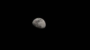 File - The moon is photographed in its waxing gibbous phase as the International Space Station orbited 256 miles above the North Pacific Ocean south of Alaska's Aleutian Islands.