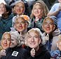 FILE - In this Oct. 31, 2018, file photo, demonstrators hold images of Amazon CEO Jeff Bezos near their faces during a Halloween-themed protest at Amazon headquarters over the company's facial recognition system, "Rekognition," in Seattle. San Francisco is on track to become the first U.S. city to ban the use of facial recognition by police and other city agencies as the technology creeps increasingly into daily life. Studies have shown error rates in facial-analysis systems built by Amazon, IBM and Microsoft were far higher for darker-skinned women than lighter-skinned men. (AP Photo/Elaine Thompson, File)