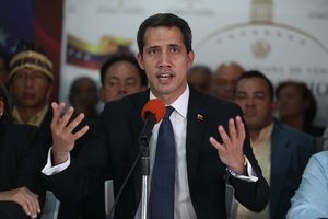 Venezuela's opposition leader and interim president Juan Guaido, speaks during a press conference at his campaign office in Caracas, Venezuela, Tuesday, May 14, 2019