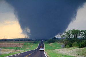 File - One of several violent tornadoes that touched down across Kansas on April 14, 2012. This particular tornado was located 5 miles west of Marquette, Kansas and was rated EF4.