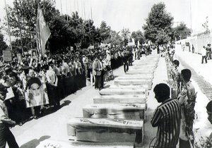 Seventy-six coffins containing the remains of some of the 290 victims of the Iran Air passenger plane which was shot down Sunday, July 4, in the Persian Gulf by the USS Vincennes are arranged in a line in front of the Iranian parliament prior to a funeral procession in Theran Thursday, July 7, 1988, according to the official Iranian news agency which released this photo.