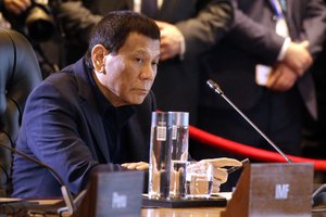 Philippines President Rodrigo Duterte attends an International Monetary Fund (IMF) informal dialogue session at APEC Haus in Port Moresby, Papua New Guinea, Sunday, Nov. 18, 2018.