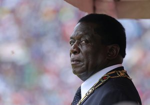 FILE - In this April 18, 2018, file photo, Zimbabwe's President Emmerson Mnangagwa attends a celebration for the country's 38th anniversary of Independence at the National Sports Stadium in Harare.