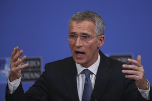 NATO's Secretary General Jens Stoltenberg gestures during a news conference at NATO headquarters in Brussels, Tuesday, Feb. 12, 2019