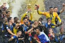 France goalkeeper Hugo Lloris lifts the trophy after France won 4-2 during the final match between France and Croatia at the 2018 soccer World Cup in the Luzhniki Stadium in Moscow, Russia, Sunday, July 15, 2018. (AP: Martin Meissner)