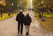 Couple walking in a park in the evening