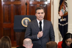 CNN journalist Jim Acosta does a standup before a new conference with President Donald Trump in the East Room of the White House, Wednesday, Nov. 7, 2018, in Washington.