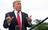 US President Donald Trump speaks to the media prior to departing on Marine One from the South Lawn of the White House in Washington, DC on May 20, 2019, as he travels to Pennsylvania for a campaign rally. (Photo by SAUL LOEB / AFP)