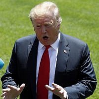 US President Donald Trump speaks to members of the media on the South Lawn of the White House in Washington, May 24, 2019, before boarding Marine One for a short trip to Andrews Air Force Base, Maryland, and then on to Tokyo. (AP Photo/Pablo Martinez Monsivais)