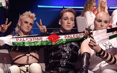 Iceland's Hatari holds up Palestinian flags during Eurovision in Tel Aviv, May 19, 2019. (YouTube screenshot)