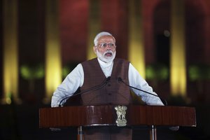 Indian Prime Minister Narendra Modi speaks to the media after meeting with the President to stake claim to form the government in New Delhi, India, Saturday, May 25, 2019.