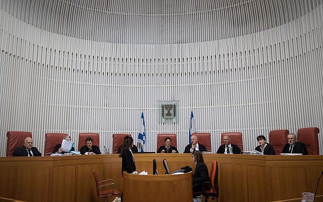 ‎Supreme Court Chief justice Esther Hayut (C) and other judges on the court are seen ahead of a hearing on March 14, 2019. (Hadas Parush/Flash90)