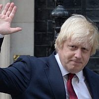 In this file photo from July 13, 2016, Boris Johnson waves as he leaves 10 Downing Street in London. (Oli Scarff/AFP)