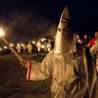 Illustrative: In this April 23, 2016 photo, members of the Ku Klux Klan participate in cross burnings after a 'white pride' rally in rural Paulding County near Cedar Town, Georgia. (AP Photo/John Bazemore)