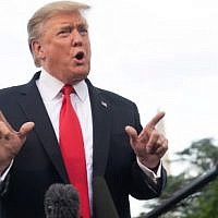 US President Donald Trump speaks to the media prior to departing on Marine One from the South Lawn of the White House in Washington, DC on May 20, 2019, as he travels to Pennsylvania for a campaign rally. (Photo by SAUL LOEB / AFP)