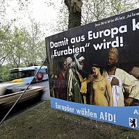 In this Monday, April 29, 2019 photo, an election campaign poster of the Alternative for Germany (AfD) party displayed next to a road in Berlin, Germany. (AP Photo/Michael Sohn)