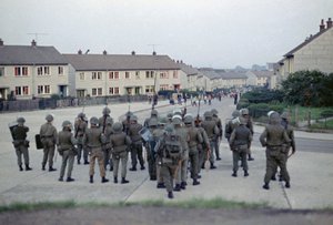 British troops using rubber bullet against rioters on the Ballymurphy Estate in Belfast, Northern Ireland in 1970.