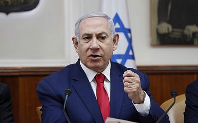 Prime Minister Benjamin Netanyahu speaks during the weekly cabinet meeting in Jerusalem, on April 14, 2019. (RONEN ZVULUN /AFP)