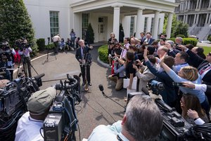 White House National Security Adviser Ambassador John Bolton speaks to reporters on events occurring in Venezuela Tuesday, April 30, 2019, outside the West Wing entrance of the White House