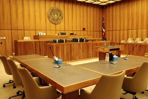 A U.S. federal courtroom sits empty on Monday, Feb. 13, 2017 in Honolulu. (AP Photo/Jennifer Sinco Kelleher)