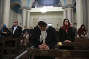 Iranian Christian worshippers attend the Christmas mass at the Saint Joseph Chaldean-Assyrian Catholic church, in Tehran, Iran, Monday, Dec. 25, 2017