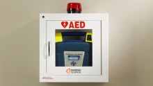 A wall-mounted automated external defibrillator