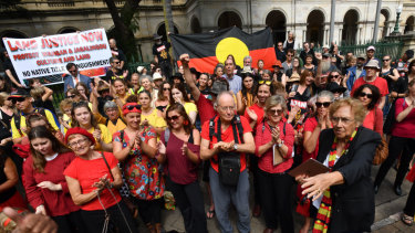 Wangan and Jagalingou traditional owners and their supporters protesting outside Parliament House in Brisbane in March last year. 