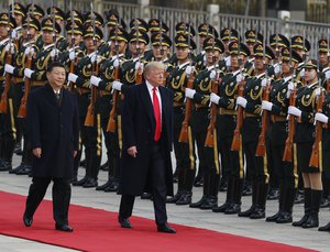 Donald Trump, and Chinese President Xi Jinping, , attend a welcome ceremony at the Great Hall of the People in Beijing