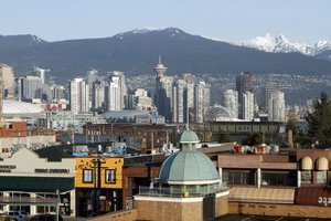 This is the skyline of downtown Vancouver  during the 2010 Winter Olympics in Vancouver, British Columbia, Wednesday, Feb. 17, 2010. (AP Photo/Gene J. Puskar)