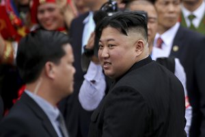 North Korean leader Kim Jong Un, center, departs Dong Dang railway station in Dong Dang, Vietnamese border town Saturday, March 2, 2019.