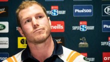 David Pocock looks to his left as he listens to questions at his Brumbies retirement media conference.