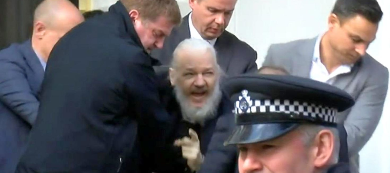 WikiLeaks Editor-in-Chief Julian Assange is expelled from the Ecuadorian Embassy and arrested by British police. Screenshot of Ruptly coverage.