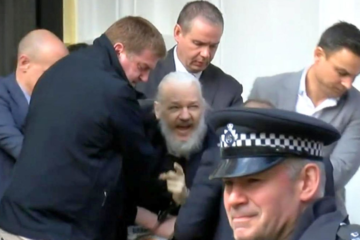 WikiLeaks Editor-in-Chief Julian Assange is expelled from the Ecuadorian Embassy and arrested by British police. Screenshot of Ruptly coverage.