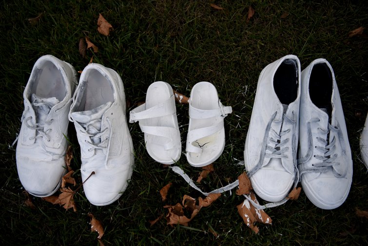 Shoes laid out in memory of the 50 who were killed in the attack on a mosque in Christchurch, New Zealand