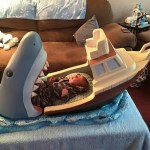 Uncle Builds 'Jaws' Crib for Infant Nephew That Makes It Look Like He's in a Boat Being Eaten by a Shark