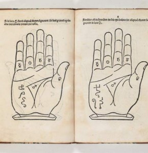 open book showing diagram of hands