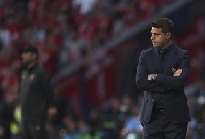 Tottenham's coach Mauricio Pochettino watches the Champions League final soccer match between Tottenham Hotspur and Liverpool at the Wanda Metropolitano Stadium in Madrid, Saturday, June 1, 2019.