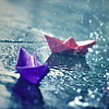 chalcopyrite: Two little folded-paper boats in the rain (Default)