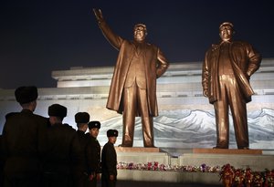 North Korean soldiers line up as they pay respect to the bronze statues of their late leaders Kim Il Sung and Kim Jong Il at Mansu Hill Grand Monument in Pyongyang, North Korea, Sunday, Dec. 16, 2018.