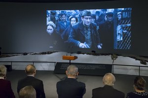 Russian President Vladimir Putin, second left, Israeli Prime Minister Benjamin Netanyahu, center, watch a movie about the Sobibor uprising during their meeting marking 75th anniversary of the Sobibor uprising at the Jewish Museum and Tolerance Center in Moscow in Moscow, Russia, Monday, Jan. 29, 2018.