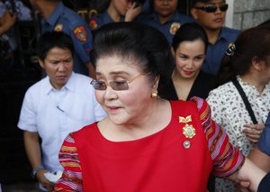 Former First Lady and widow of the late dictator Ferdinand Marcos, Congresswoman Imelda Marcos arrives at the Commission on Elections to lend her support for her daughter Governor Imee Marcos in filing her Certificate of Candidacy or COC for a Senate seat in the May 2019 midterm elections Tuesday, Oct. 16, 2018, in Manila, Philippines