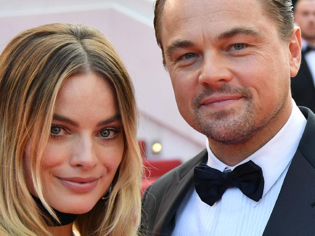 Margot Robbie, Leonardo DiCaprio and Brad Pitt pose at the Cannes premiere of Once Upon a Time … in Hollywood.