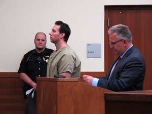 Former critical care doctor William Husel, center, pleads not guilty to murder charges in the deaths of 25 hospital patients while appearing with defense attorney Richard Blake, right, in Franklin County Court on Wednesday, June 5, 2019, in Columbus, Ohio