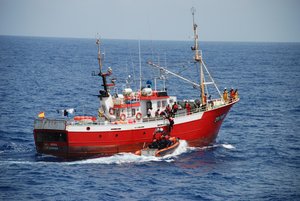 ATLANTIC OCEAN - A boarding team consisting of crewmembers from the Coast Guard Cutter Legare and representatives of the Cape Verde Coast Guard and Judiciary Police embark a fishing boat during boarding operations, Sept. 2, 2009. The Legare and its crew were in Cape Verde serving as the Africa Partnership Station (APS) platform for the U.S. Navy 6th Fleet in West Central Africa. APS is an initiative by the U.S. and several European countries to conduct joint maritime law enforcement operations with participating African nations including Morocco, Senegal, Sierra Leone and Cape Verde. (U.S. Coast Guard photo by Petty Officer 2nd Class Shawn Eggert) (653285) ( Cape Verde LEDET )