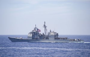 The Ticonderoga-class guided-missile cruiser USS Chancellorsville (CG 62) sails in group formation with ships from the U.S., Japan Maritime Self-Defense Force and Indian navy during Exercise Malabar 2018